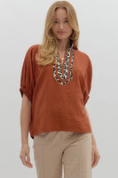 Rust Leopard Print V Neck Blouse
